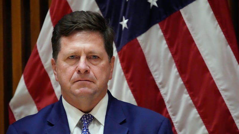 FILE - Jay Clayton, U.S. Attorney for the Southern District of New York, listens during a news...