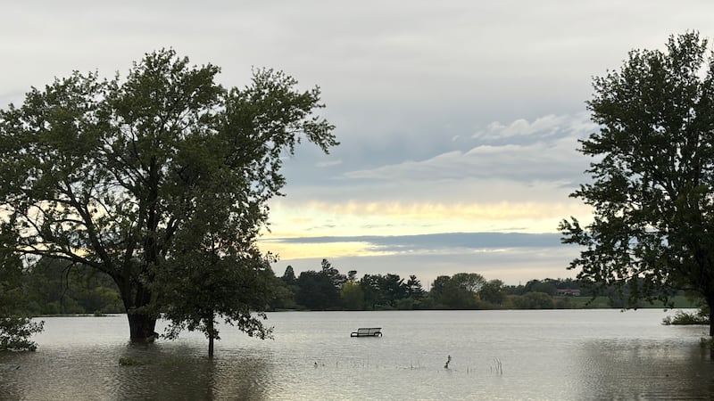 Holmes Lake in Lincoln overflowing after historic downpour.
